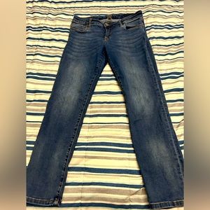 Medium wash light distressed skinny Jean